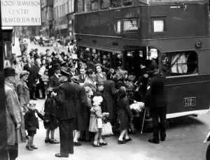 Wartime Prints: Flashback to the dark days of 1939, as Liverpool children board a bus to take them to