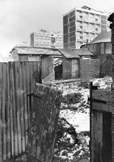 Redevelopment Prints: Flat dwellers look down on a huddle of crumbling outhouses in Hillfields, Coventry