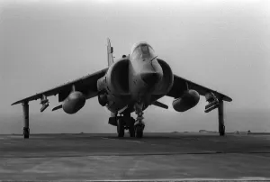 A Fleet Air Arm Sea Harrier prepares to take off from the flight deck of HMS Invincible