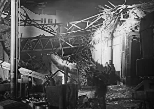 Floodlights light the scene of a V2 explosion at Smithfield Market, Farringdon Road