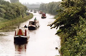 A flotilla of barges winds their way through the waterways of Aintree and Bootle