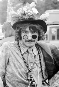 00182 Prints: Flower Power festival at Woburn Abbey, August 1967 A hippy man wearing an elaborate
