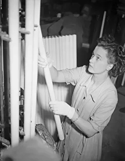 Fluorescent tubes being manufactured at the Thorn Electrics factory in Enfield 14th