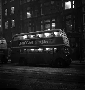 Advertising Prints: Fog scenes in the Strand. A London Transport bus seen here carrying commuters home