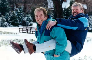 Broadcaster Prints: Folk singer Jimmie Macgregor (left) giving a piggy back to cartoonist Malky McCormack