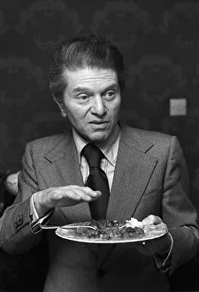 00057 Prints: Food critic Egan Ronay seen here at the home of the Daily Mirror Cook Sonia Allison