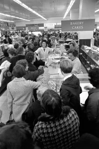 Food: Industrial Disputes: Scores of shoppers line the counter at Lewis