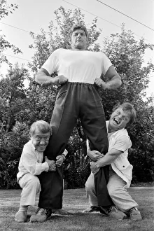 Six foot six inch actor David Prowse who plays Star Wars villain Darth Vader in