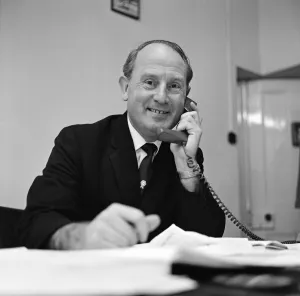 Book Prints: Football agent Ken Stanley reading a George Best annual. 18th February 1970
