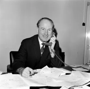 01216 Prints: Football agent Ken Stanley reading a George Best annual. 18th February 1970