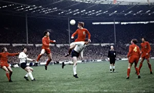 Football England v Wales 1969 Wyn Davies leaps above Jack Charlton May 1969