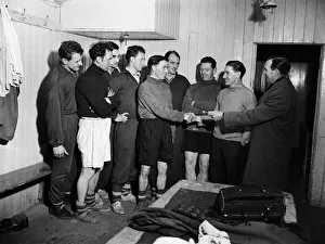Football manager Jimmy Logie pictured with members of his new team