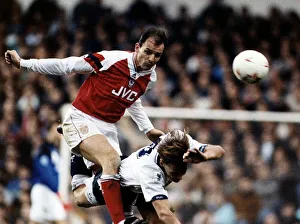 Football player Steve Bould for Arsenal against tackles Teddy Sheringham
