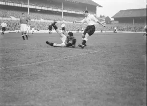 00226 Prints: Football Tottenham v Fulham Black (Fulham) takes ball from feet of Medley
