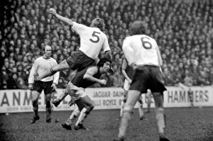 Football: West Ham vs. Burnley F. C. Burnleys Colin Waldren leaving heavily on Bobby