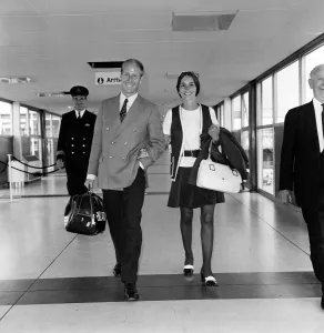 Footballer Bobby Charlton and his wife Norma leaving Heathrow Airport for Australia