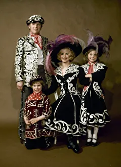 Costers Prints: Footballer Bobby Moore and his family dressed as Pearly kings and queens April 1975