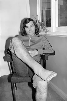 Footballer: George Best. George Best shows his injured legs today