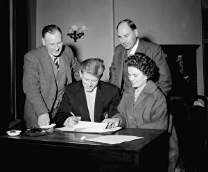 Footballer Gerry Hitchens signs on for Aston Villa FC December 1957