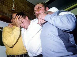 00449 Prints: Footballer Paul Gascoigne - Gazza A worse for wear Paul Gascoigne is helped