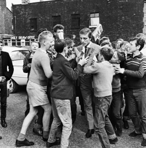 Footballer Peter Thompson signs for his new club Liverpool after his &pound;37