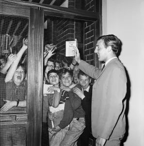 Footballer Peter Thompson signs for his new club Liverpool after his £37