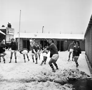 00750 Prints: Footballer players of non league Gravesend and Northfleet pictured having a snowball