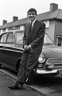 Footballer Terry Venables on his way to work using public transport in London