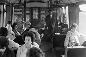 Footballer Terry Venables on his way to work using public transport in London