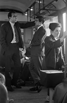 Footballer Terry Venables on his way to work using public transport in London