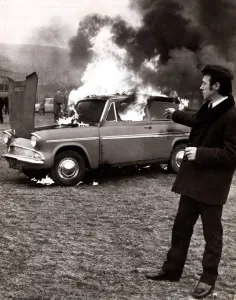 Ford - Motor Cars George Terrace sets fire to his car to draw attention to shoddy