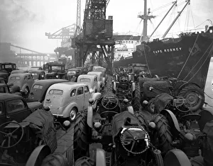 Ford Prefects and Fordson tractors seen here on a Dagenham quayside