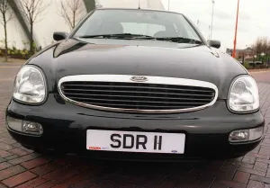 Ford Prints: FORD SCORPIO front view March 1998 Radiator grille SDR 11 number plate Ford