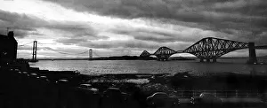 Forth Railway Bridge in Scotland - October 1964 Forth Road Bridge in the distance