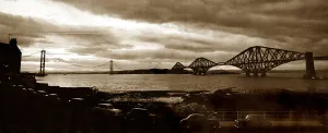 Forth Railway Bridge in Scotland - October 1964 Forth Road Bridge in the distance