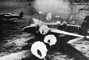 Airfield Prints: Fragmentation bombs dropped by B-25 Mitchell bombers over Japanese planes in Luzon