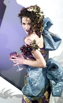 Wine Prints: France Paris Fashion Week Christian Dior Collection 1999 Model holding a wine glass