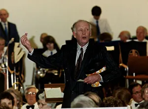 Frank Bough TV presenter drawing the raffle at a charity dinner