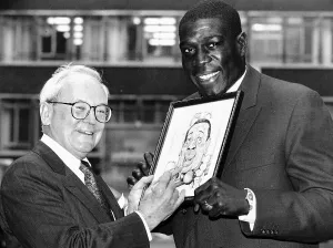 00130 Prints: Frank Bruno Boxing receives the Cartoonists Club Joker of the Year Award 1993 from his