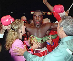 Frank Bruno celebrates his win in the WBC World Boxing Council Championship title fight