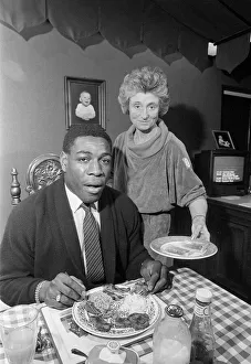 Dinner Prints: FRANK BRUNO EATING FOOD SERVED BY SYLVIA LAWLESS 10 / 04 / 1986