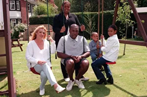 00129 Prints: Frank Bruno former Heavyweight Boxer July 1998 at his home in Essex with wife