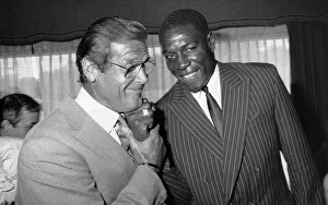 Frank Bruno and Roger Moore at Variety Club Awards party - 27 / 06 / 1989