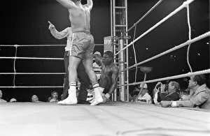 01428 Prints: FRANK BRUNO VS TIM WITHERSPOON FIGHTING FOR THE WBA HEAVYWEIGHT TITLE 19 / 07 / 1986