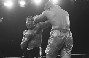 01428 Prints: FRANK BRUNO VS TIM WITHERSPOON FIGHTING FOR THE WBA HEAVYWEIGHT TITLE - 19 / 07 / 1986