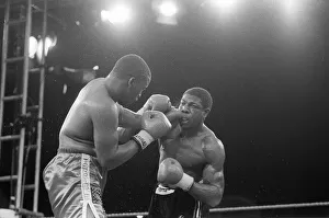 01428 Prints: FRANK BRUNO VS TIM WITHERSPOON FIGHTING FOR THE WBA HEAVYWEIGHT TITLE - 19 / 07 / 1986