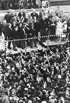 Frank Collier holds the cup aloft during the civic reception for the Widnes team to