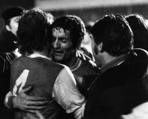 00000 Prints: Frank McLintock Arsenal skipper hugs Eddie Kelly 1970