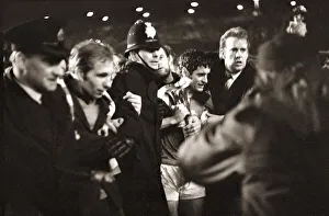 Frank McLintock helped off the pitch April 1970 holding InterCities Fairs Cup