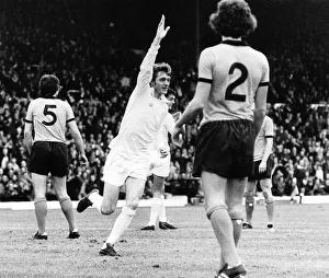 Frank Munro and Geoff Palmer stand stunned as scorer Alan Clarke celebrates his goal for